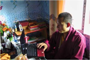 Trungpa XII Rinpoche at the desk of his residence in Sertha