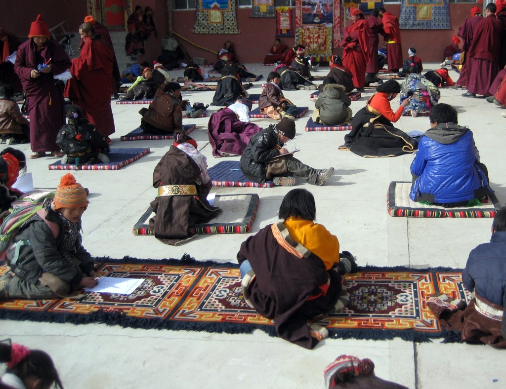 Children taking exams at the end of the school session